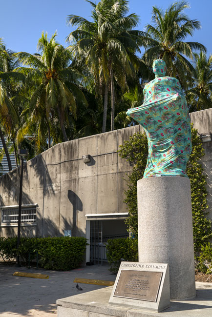 Joiri Minaya, The Cloaking of the statue of Christopher Columbus behind the Bayfront Park Amphitheatre, Miami, Florida, 2019. Dye-sublimation print on spandex fabric and wood structure. Photo by Zachary Balber, commissioned by Fringe Projects Miami.