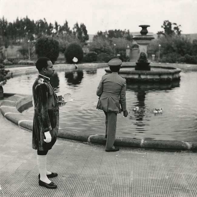 Griffith J. Davis. His Imperial Majesty Emperor Haile Selassie feeding his ducks in the pond of the Imperial Palace in Addis Ababa, Ethiopia,1950: Cover story of Ebony’s 5th Anniversary issue November 1950. Digital black and white print. 12 x 12 in. Griffith J. Davis Photographs and Archives.